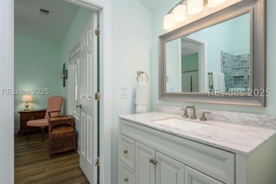 Experience refined Lowcountry living in this exquisitely