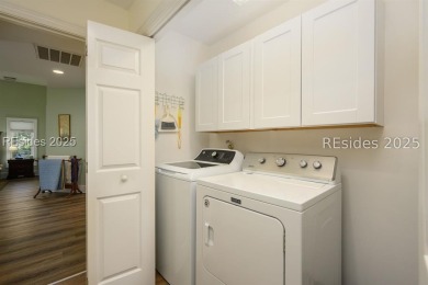 Experience refined Lowcountry living in this exquisitely