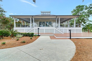 Experience refined Lowcountry living in this exquisitely
