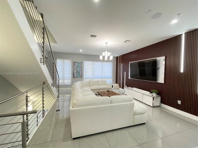 LUXURY LANDMARK DORAL, THIS STUNNING 4-STORY TOWNHOUSE! BOASTING