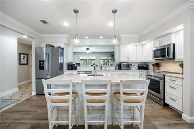 **JUST MINUTES FROM FORT MYERS BEACH, THIS STUNNING COASTAL