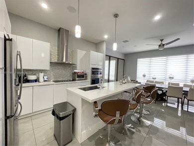 LUXURY LANDMARK DORAL, THIS STUNNING 4-STORY TOWNHOUSE! BOASTING