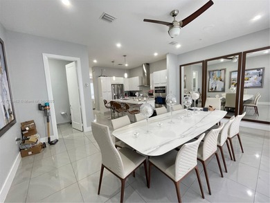LUXURY LANDMARK DORAL, THIS STUNNING 4-STORY TOWNHOUSE! BOASTING