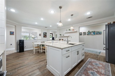 **JUST MINUTES FROM FORT MYERS BEACH, THIS STUNNING COASTAL