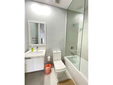 LUXURY LANDMARK DORAL, THIS STUNNING 4-STORY TOWNHOUSE! BOASTING