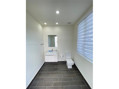 LUXURY LANDMARK DORAL, THIS STUNNING 4-STORY TOWNHOUSE! BOASTING