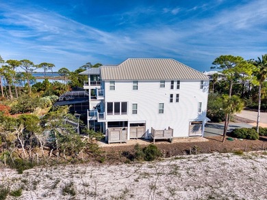 The best of both worlds, secluded gulf beaches and the bay! This