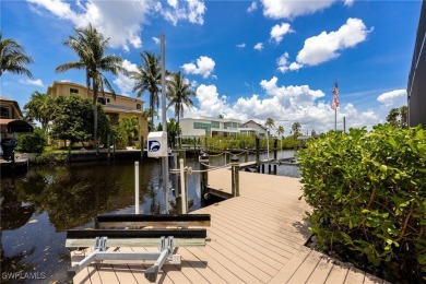 **JUST MINUTES FROM FORT MYERS BEACH, THIS STUNNING COASTAL