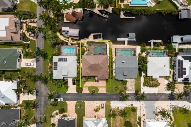 **JUST MINUTES FROM FORT MYERS BEACH, THIS STUNNING COASTAL