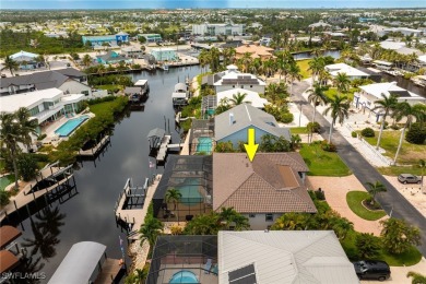 **JUST MINUTES FROM FORT MYERS BEACH, THIS STUNNING COASTAL