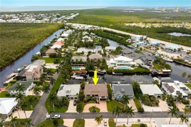 **JUST MINUTES FROM FORT MYERS BEACH, THIS STUNNING COASTAL