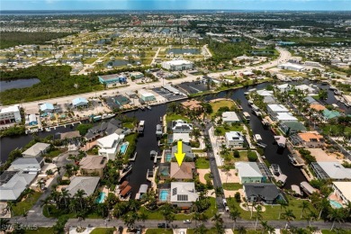 **JUST MINUTES FROM FORT MYERS BEACH, THIS STUNNING COASTAL