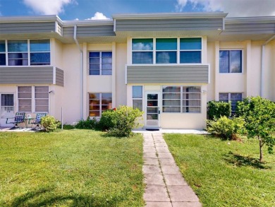 CHARLOTTE SQUARE UPDATED FIRST-FLOOR 2/2 CONDO WITH FLORIDA ROOM