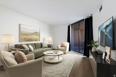 Location, light, and views make this condo truly special