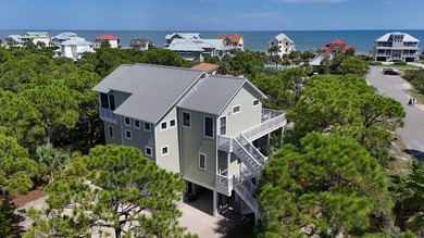 Immerse yourself in the epitome of coastal living with this