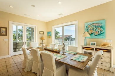 Immerse yourself in the epitome of coastal living with this