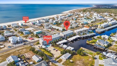 Top-floor condo unit with BOAT SLIP and stunning Gulf views in