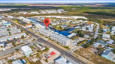 Top-floor condo unit with BOAT SLIP and stunning Gulf views in