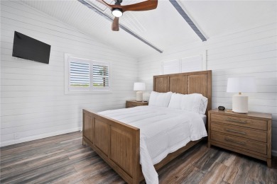 Welcome to your fully renovated lakefront retreat on beautiful