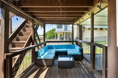 Welcome to your fully renovated lakefront retreat on beautiful