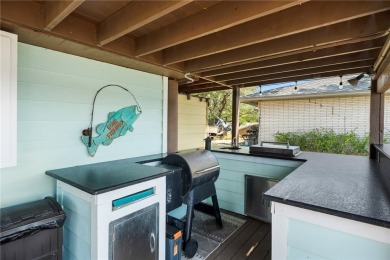 Welcome to your fully renovated lakefront retreat on beautiful