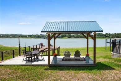 Welcome to your fully renovated lakefront retreat on beautiful