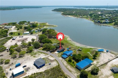 Welcome to your fully renovated lakefront retreat on beautiful