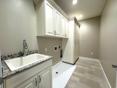 Welcome to this beautifully maintained home in prestigious