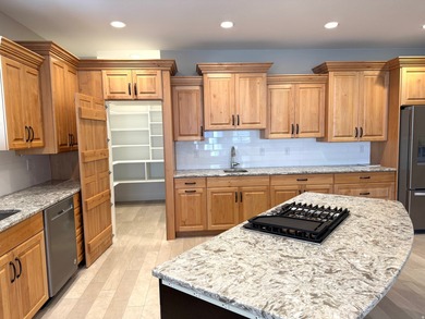 Welcome to this beautifully maintained home in prestigious