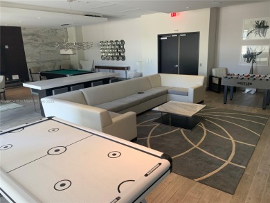 Corner unit 1 bedroom plus den, fully furnished and equipped