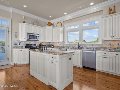 Absolutely stunning 2nd row home on elevated lot in Emerald Isle