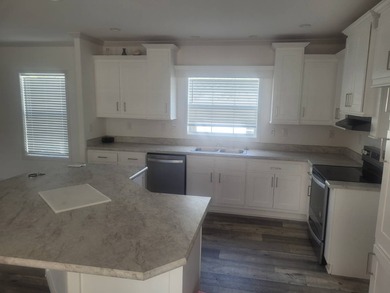 Welcome to Florida living at its finest in this almost-new