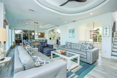 Paradise found. Welcome to an exceptional canal-front retreat on