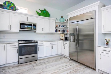 Paradise found. Welcome to an exceptional canal-front retreat on