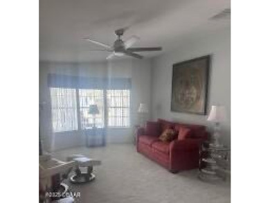 This immaculate home in a 55-plus community is move-in ready and