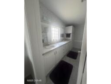 This immaculate home in a 55-plus community is move-in ready and