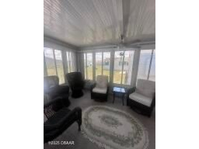 This immaculate home in a 55-plus community is move-in ready and