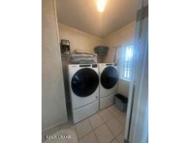 This immaculate home in a 55-plus community is move-in ready and