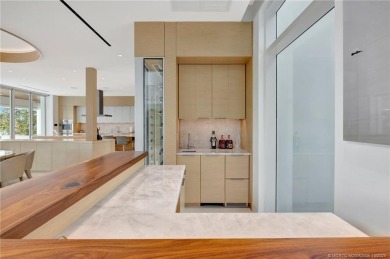 Experience the best of luxury living in this waterfront coastal