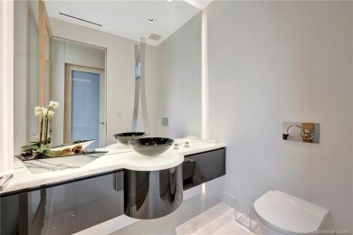 Experience the best of luxury living in this waterfront coastal