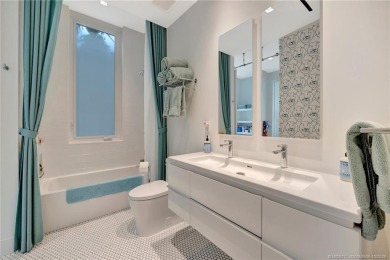 Experience the best of luxury living in this waterfront coastal