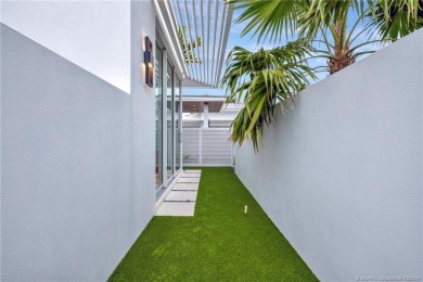 Experience the best of luxury living in this waterfront coastal