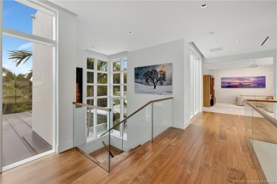 Experience the best of luxury living in this waterfront coastal