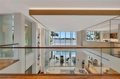 Experience the best of luxury living in this waterfront coastal