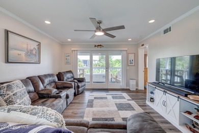 Experience coastal living at its finest in this beautifully