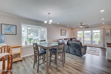 Experience coastal living at its finest in this beautifully