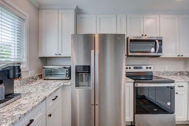 Experience coastal living at its finest in this beautifully