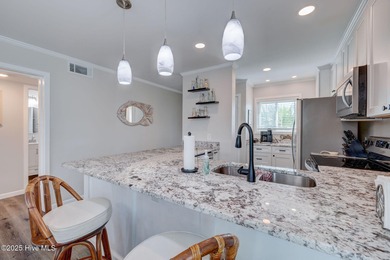 Experience coastal living at its finest in this beautifully