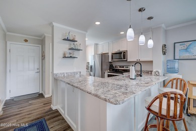 Experience coastal living at its finest in this beautifully