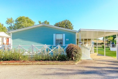 Welcome to Oceanside Landing, a highly sought-after 55+